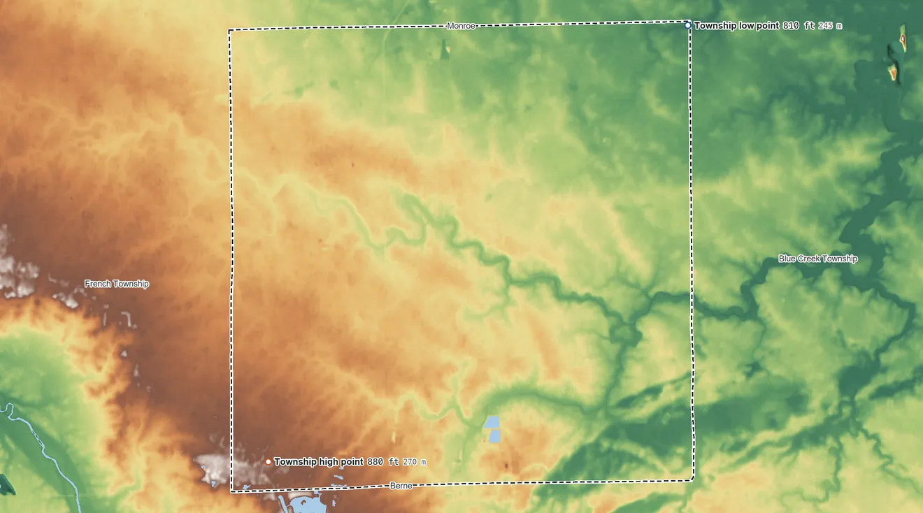 Topographic elevation map of Monroe Township, Adams County, Indiana, shaded from 810 ft on the northeast side to 880 ft on the southwest side