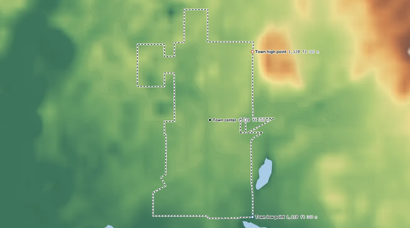Topographic elevation map of Mooreland, Indiana, shaded from 1,110 ft on the southeast side to 1,120 ft on the northeast side