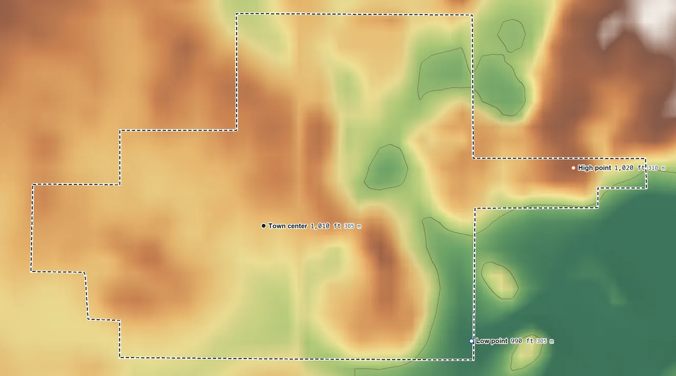 Topographic elevation map of Oakville, Indiana, shaded from 990 ft on the southeast side to 1,020 ft on the east side