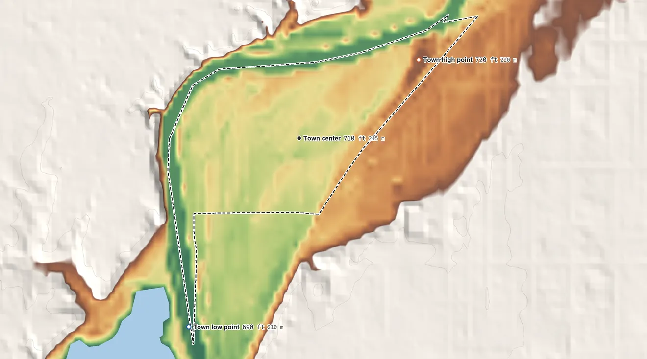 Topographic elevation map of Rocky Ripple, Indiana, shaded from 690 ft on the southwest side to 720 ft on the northeast side
