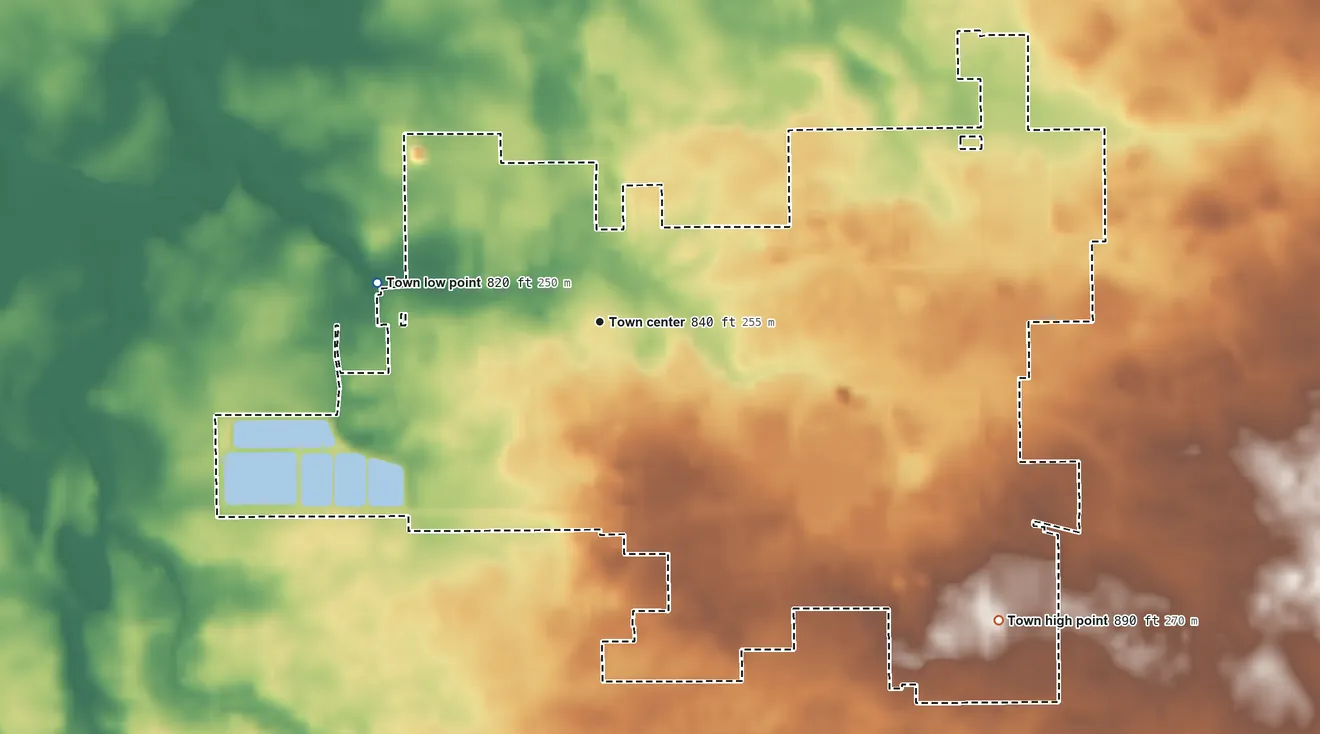 Topographic elevation map of Wakarusa, Indiana, shaded from 820 ft on the west side to 890 ft on the southeast side