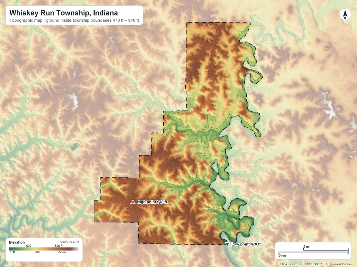 Topographic elevation map of Whiskey Run Township, Indiana, shaded from 470 ft on the southeast side to 940 ft on Pilot Knob
