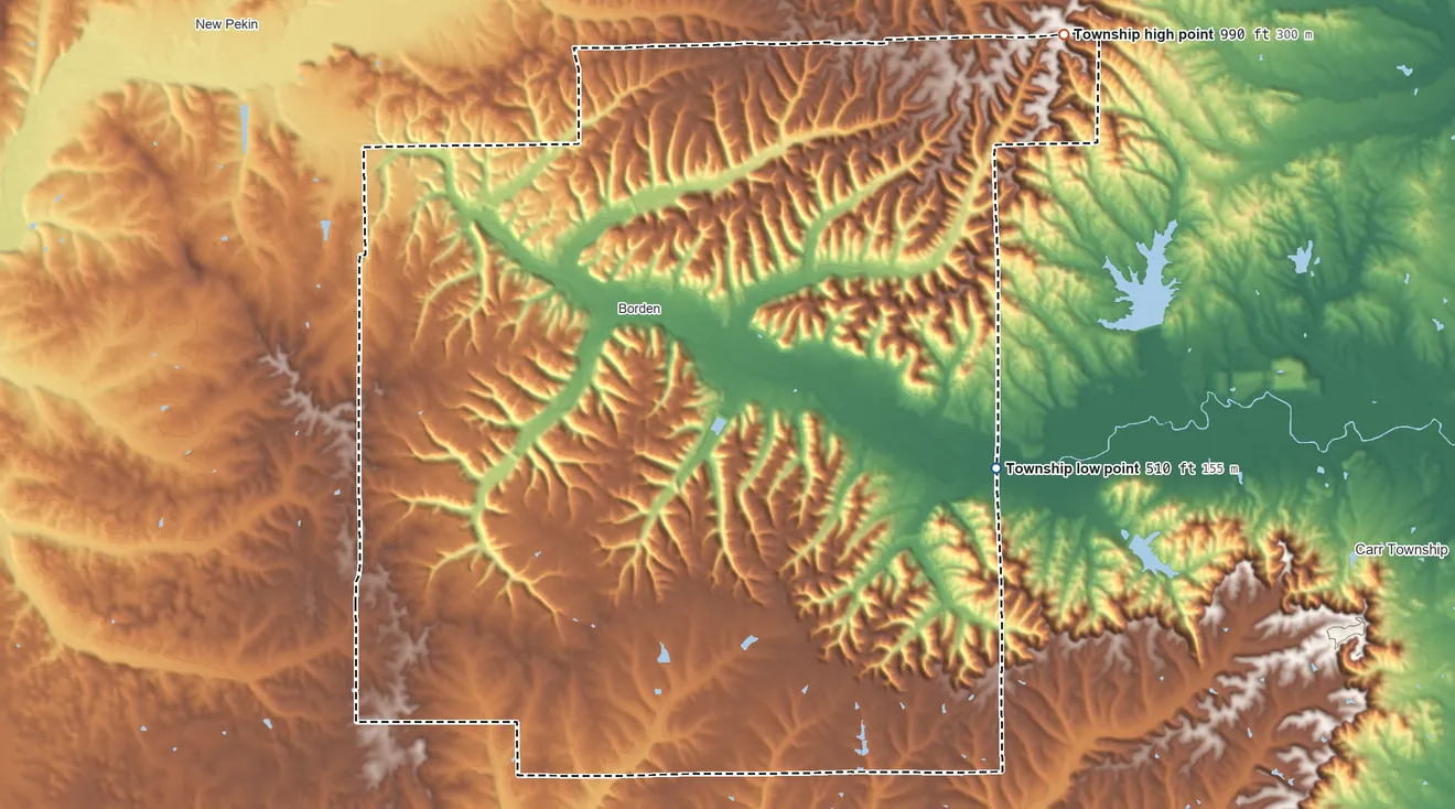 Topographic elevation map of Wood Township, Indiana, shaded from 510 ft on the east side to 990 ft on the northeast side