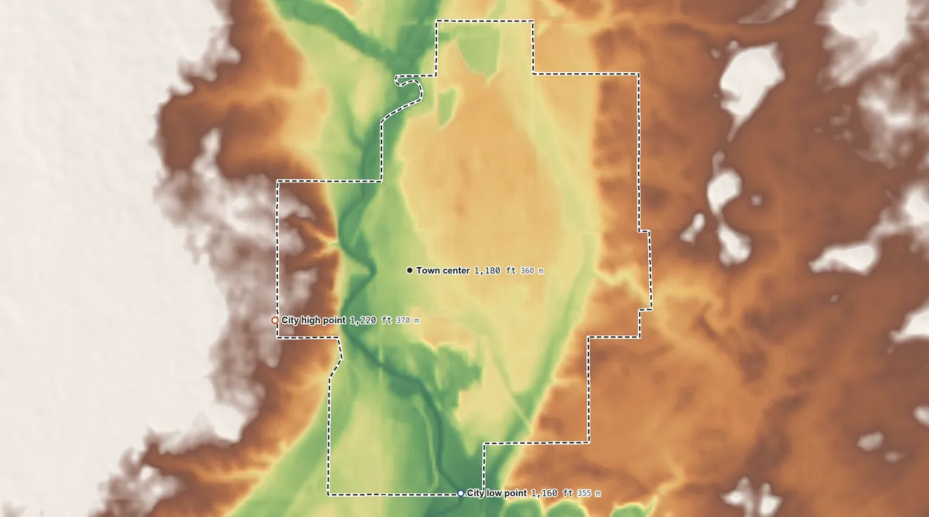 Topographic elevation map of Belmond, Iowa, shaded from 1,160 ft on the south side to 1,220 ft on the west side