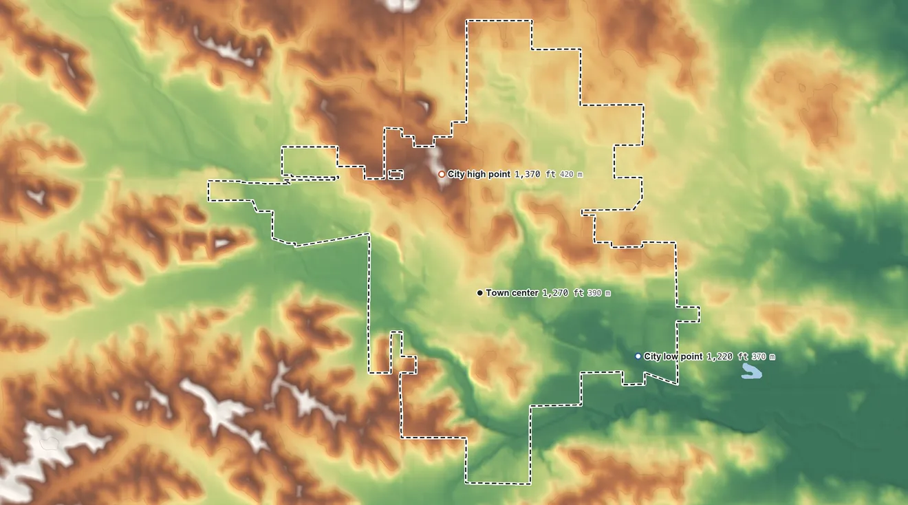 Topographic elevation map of Carroll, Iowa, shaded from 1,220 ft on the east side to 1,370 ft on the north side