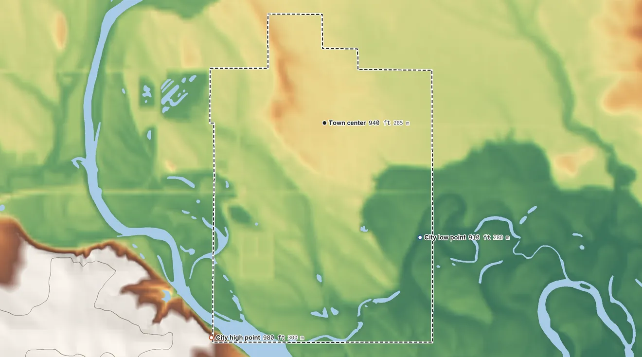 Topographic elevation map of Clarksville, Iowa, shaded from 910 ft on the southeast side to 980 ft on the southwest side