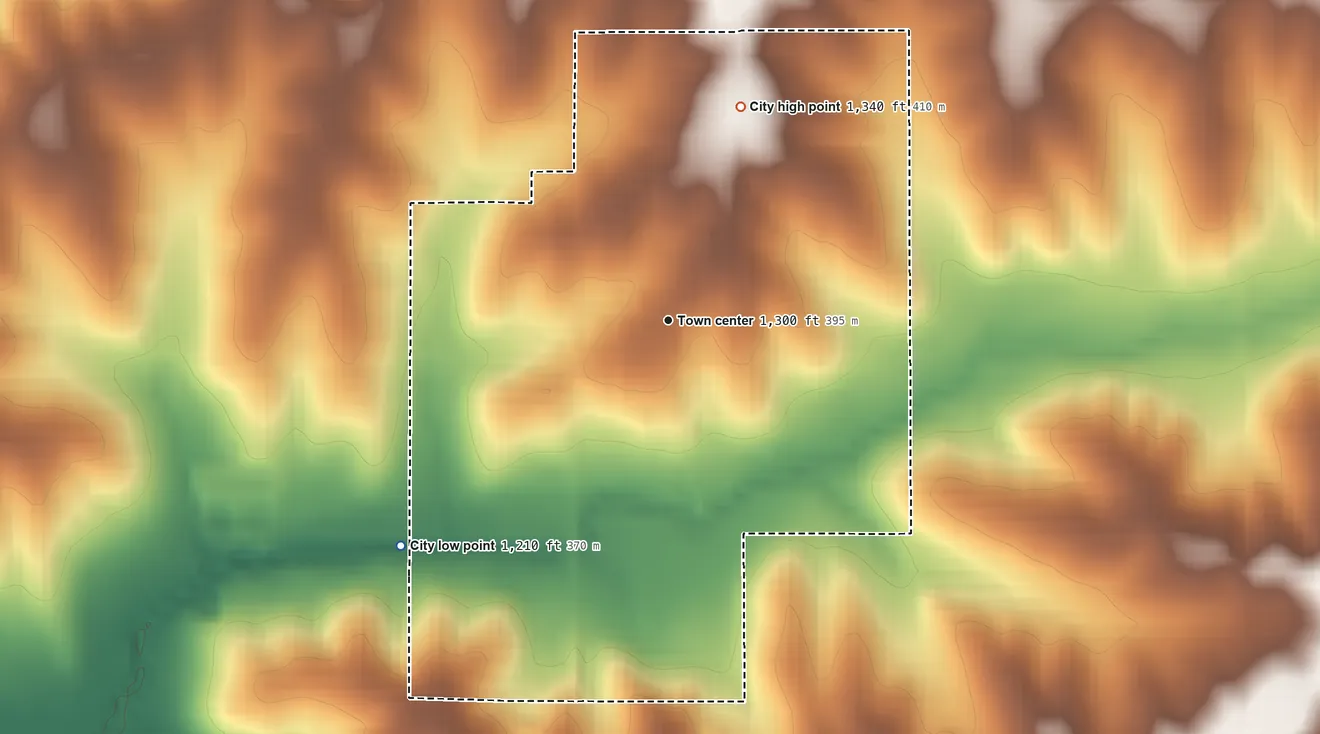 Topographic elevation map of Cumberland, Iowa, shaded from 1,210 ft on the southwest side to 1,340 ft on the north side