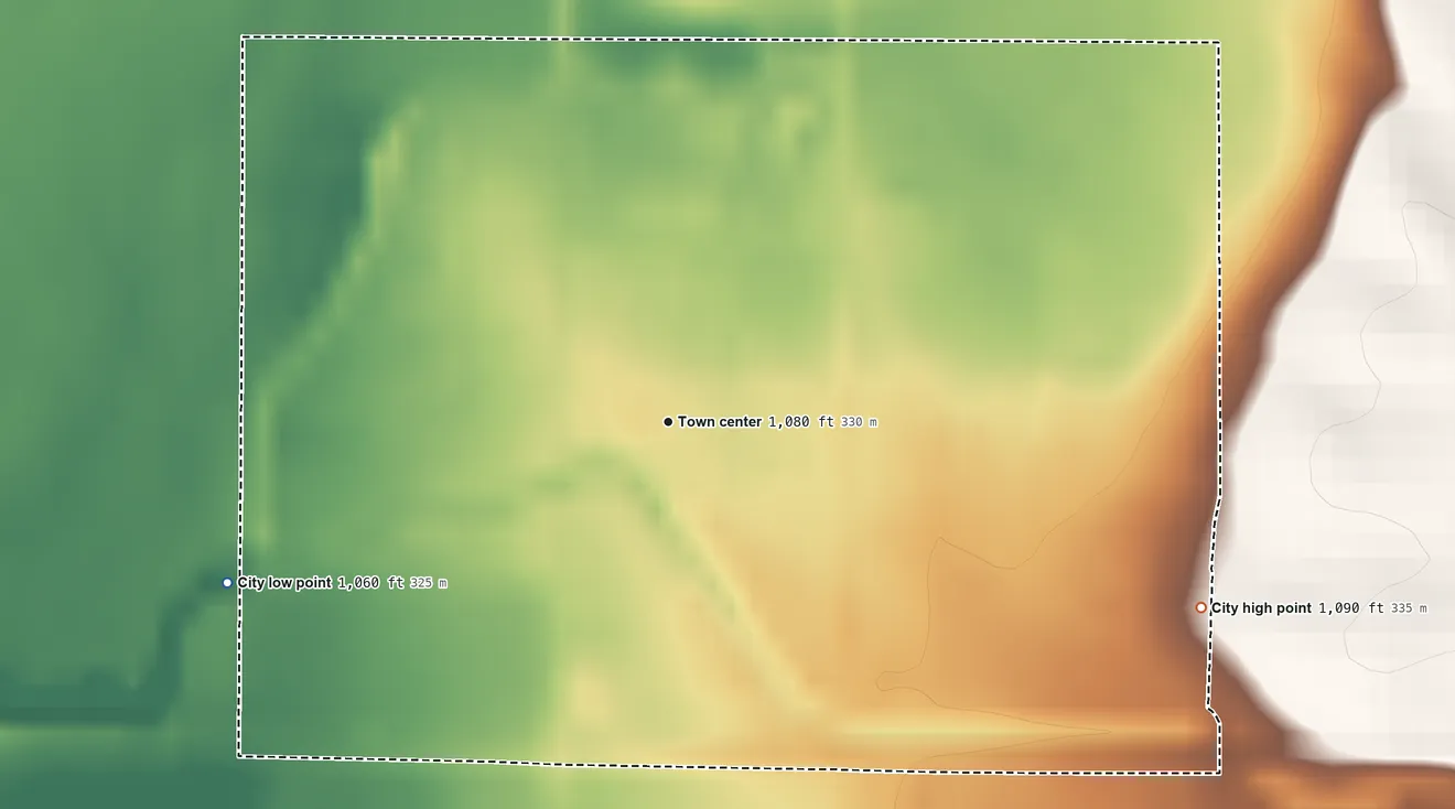 Topographic elevation map of Elliott, Iowa, shaded from 1,060 ft on the west side to 1,090 ft on the east side