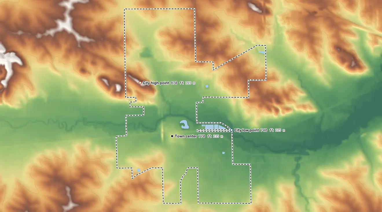 Topographic elevation map of Fairfax, Iowa, shaded from 740 ft on the east side to 870 ft on the northwest side