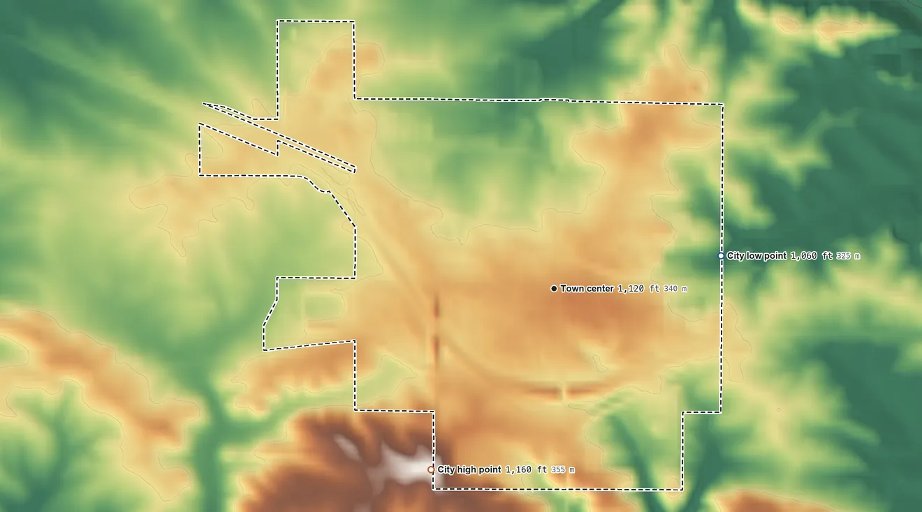 Topographic elevation map of Farley, Iowa, shaded from 1,060 ft on the east side to 1,160 ft on the southwest side