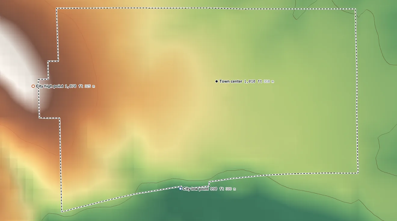 Topographic elevation map of Grand River, Iowa, shaded from 990 ft on the south side to 1,070 ft on the west side