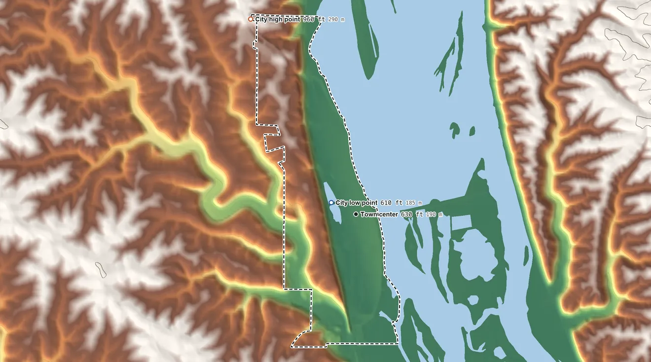 Topographic elevation map of Guttenberg, Iowa, shaded from 610 ft near the middle to 960 ft on the northwest side