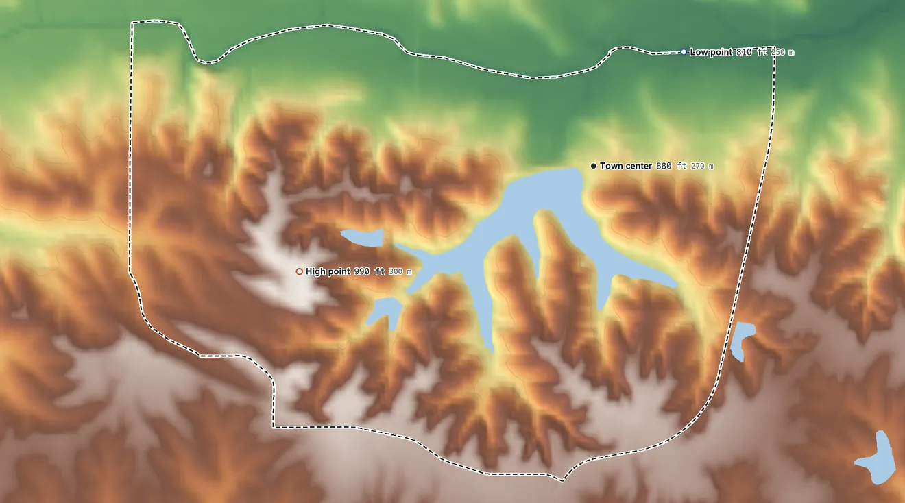 Topographic elevation map of Holiday Lake, Iowa, shaded from 810 ft on the northeast side to 990 ft on the west side