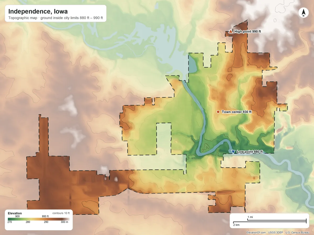Topographic elevation map of Independence, Iowa, shaded from 880 ft on the south side to 990 ft on the north side