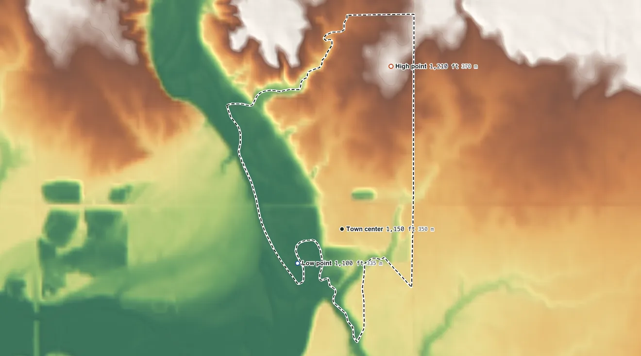 Topographic elevation map of Irvington, Iowa, shaded from 1,100 ft on the southwest side to 1,210 ft on the north side