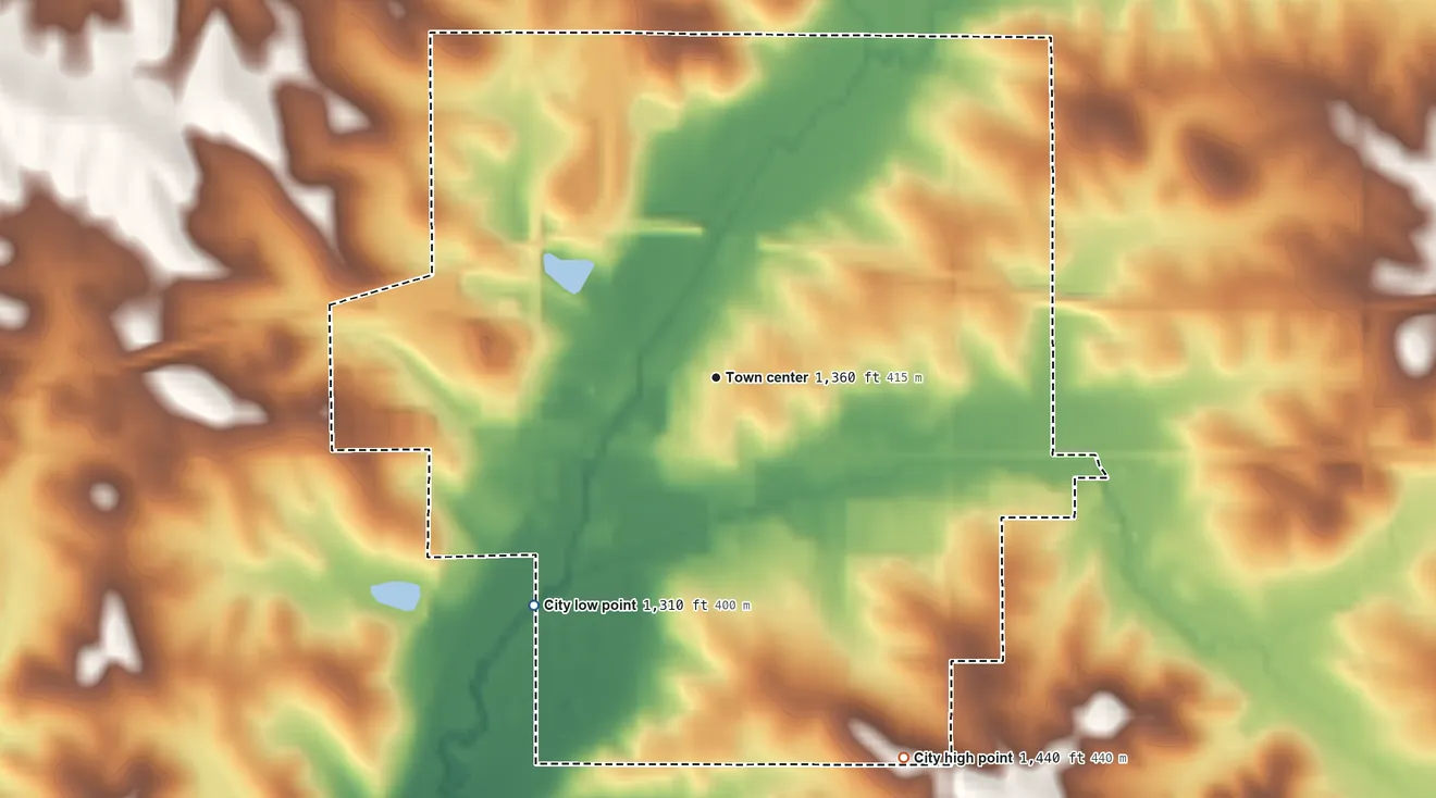 Topographic elevation map of Manning, Iowa, shaded from 1,310 ft on the southwest side to 1,440 ft on the southeast side