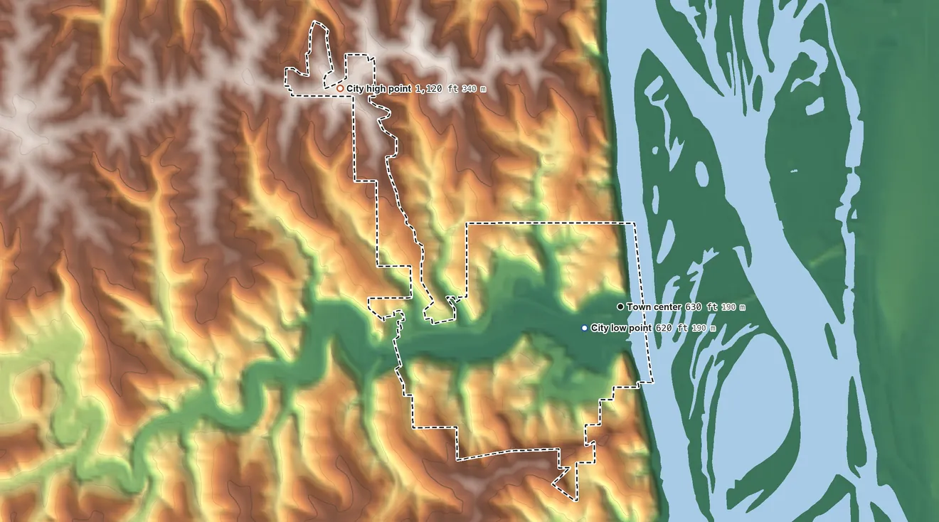 Topographic elevation map of Marquette, Iowa, shaded from 620 ft near the middle to 1,120 ft on the northwest side