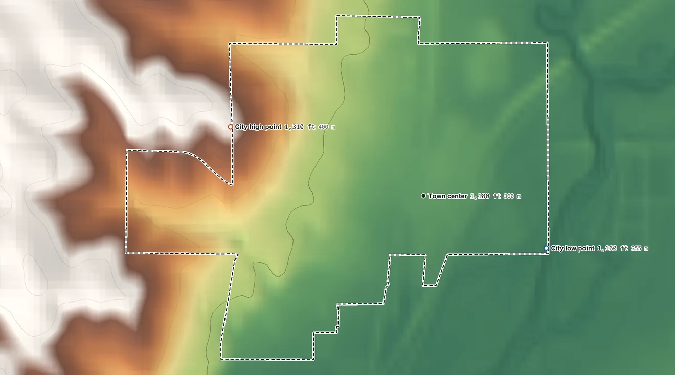 Topographic elevation map of Merrill, Iowa, shaded from 1,160 ft on the southeast side to 1,310 ft on the west side