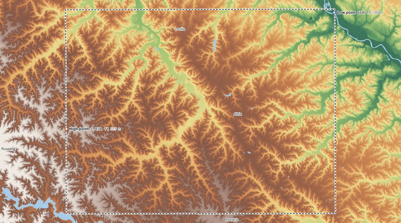 Topographic elevation map of Monroe County, Iowa, shaded from 660 ft on the northeast side to 1,030 ft on the west side