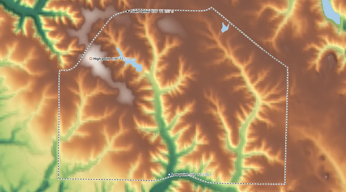 Topographic elevation map of Mooar, Iowa, shaded from 560 ft on the south side to 690 ft on the southwest side