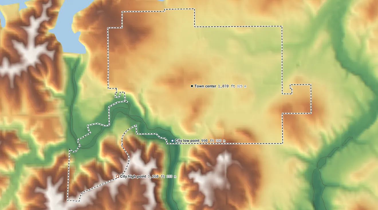 Topographic elevation map of Panora, Iowa, shaded from 990 ft on the south side to 1,160 ft on the southwest side