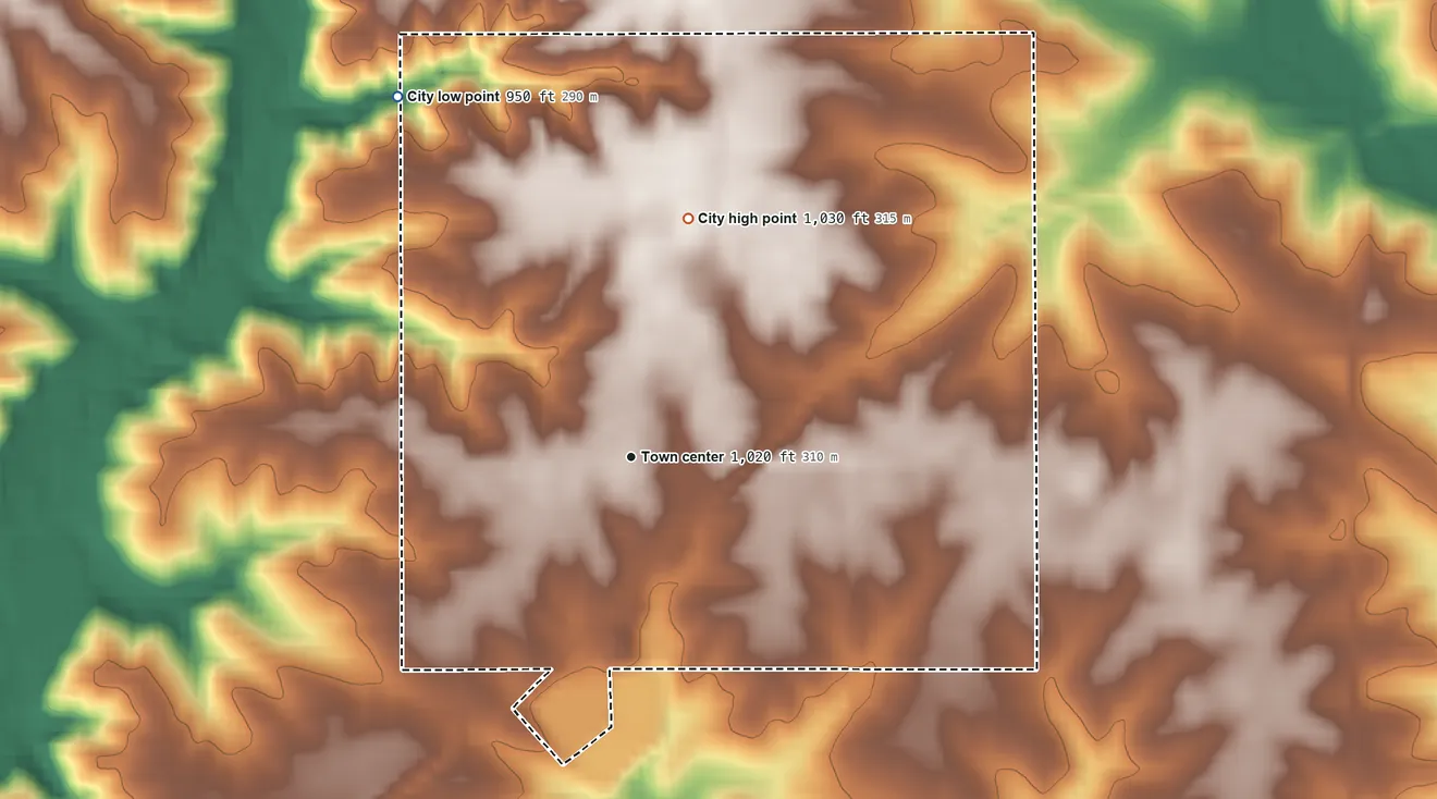 Topographic elevation map of Rhodes, Iowa, shaded from 950 ft on the northwest side to 1,030 ft on the north side