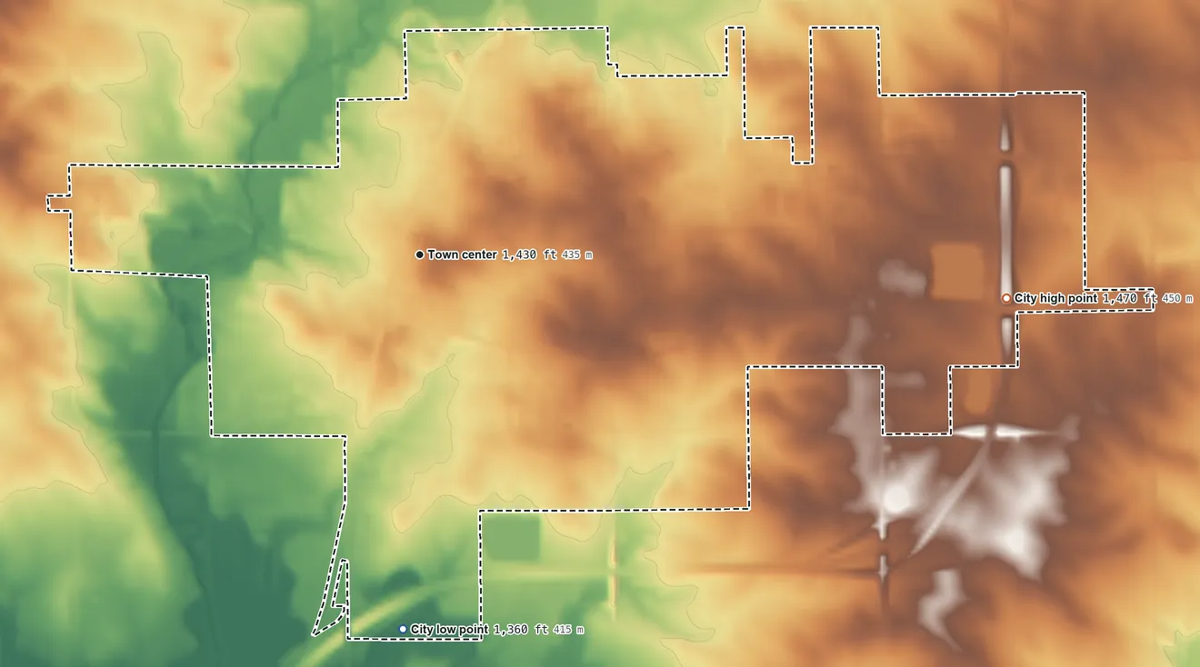 Topographic elevation map of Sheldon, Iowa, shaded from 1,360 ft on the south side to 1,470 ft on the east side
