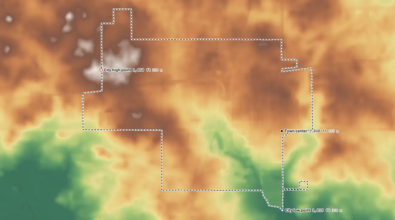 Topographic elevation map of Slater, Iowa, shaded from 1,010 ft on the south side to 1,060 ft on the west side
