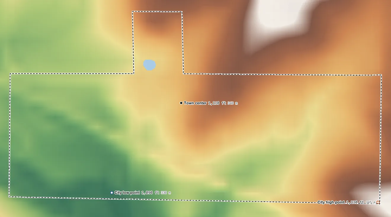 Topographic elevation map of Stanley, Iowa, shaded from 1,090 ft on the southwest side to 1,130 ft on the southeast side