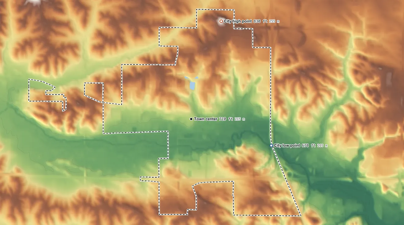 Topographic elevation map of Tiffin, Iowa, shaded from 670 ft on the east side to 830 ft on the north side