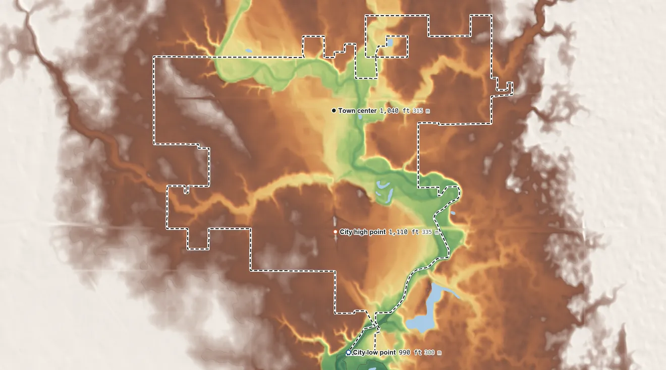 Topographic elevation map of Webster City, Iowa, shaded from 990 ft on the south side to 1,110 ft on the south side