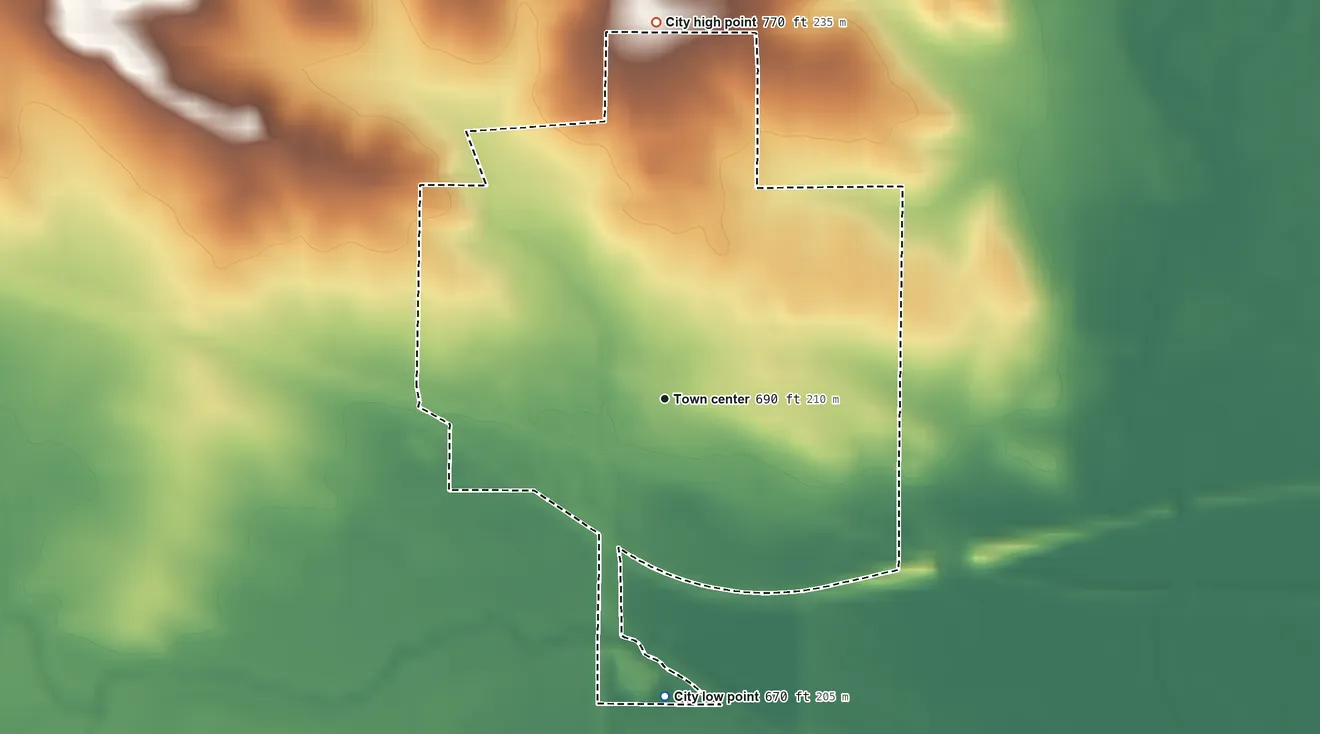 Topographic elevation map of Wheatland, Iowa, shaded from 670 ft on the south side to 770 ft on the north side
