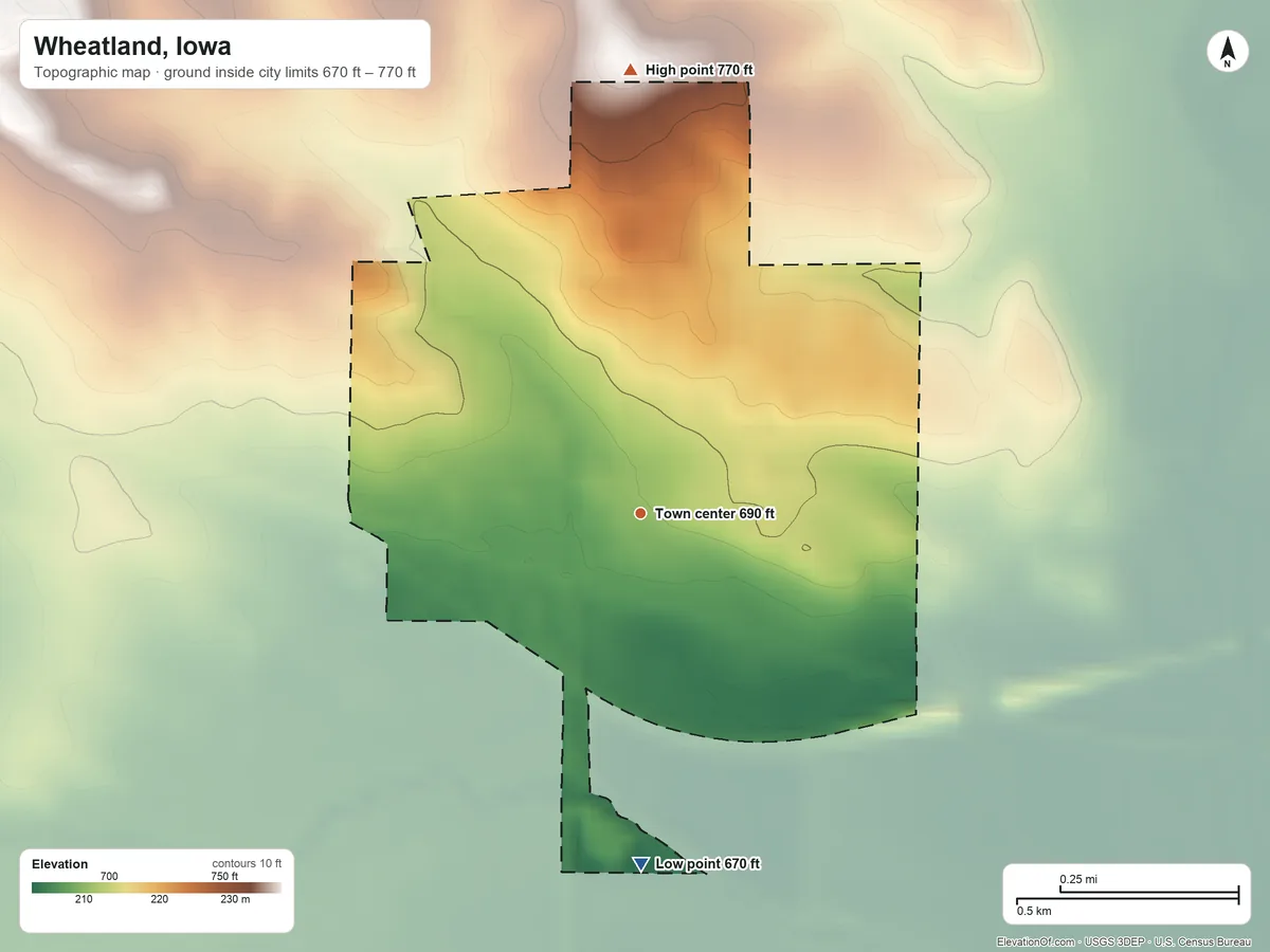 Topographic elevation map of Wheatland, Iowa, shaded from 670 ft on the south side to 770 ft on the north side