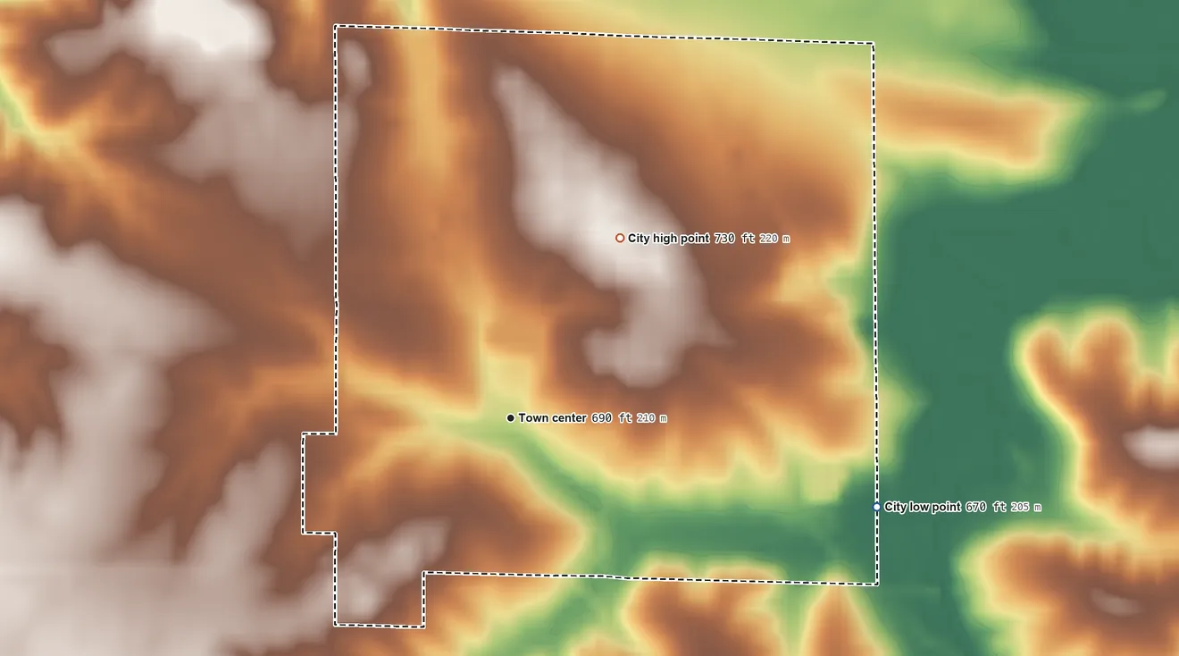 Topographic elevation map of Winfield, Iowa, shaded from 670 ft on the east side to 730 ft on the northeast side
