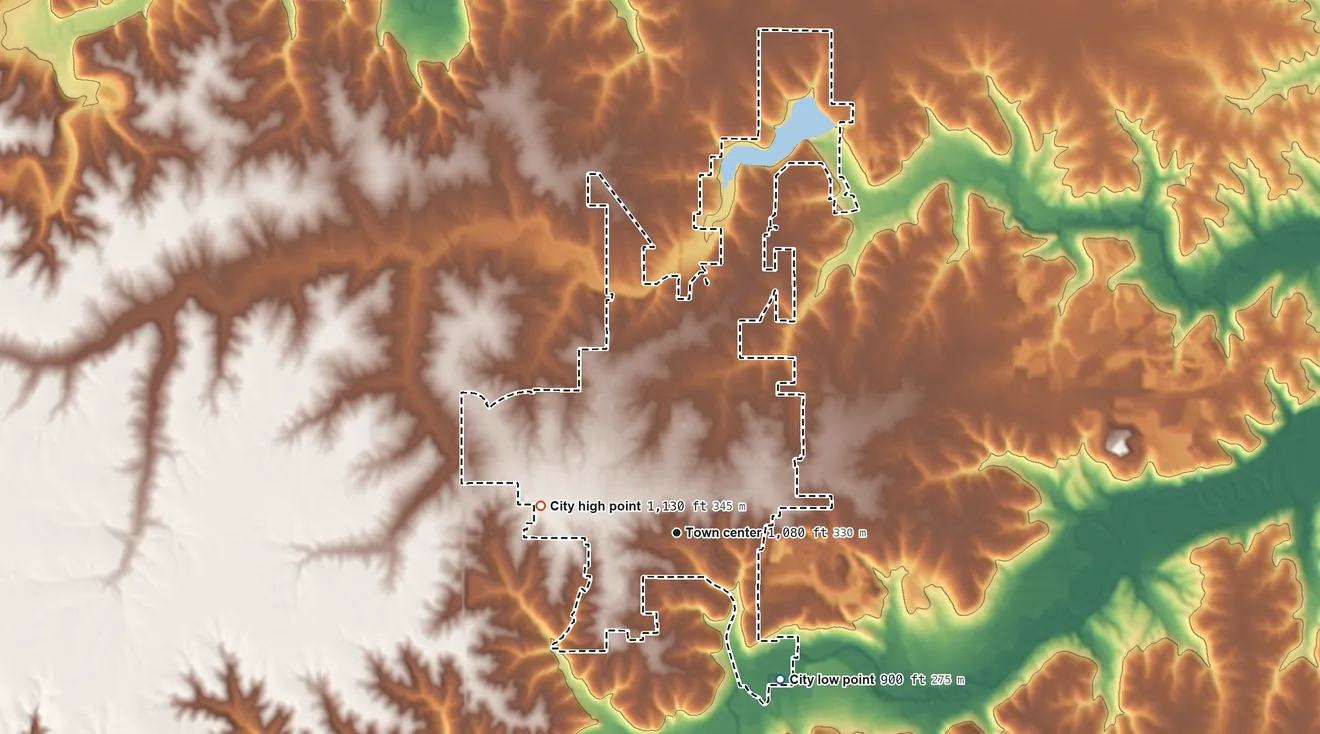 Topographic elevation map of Winterset, Iowa, shaded from 900 ft on the southeast side to 1,130 ft on the west side