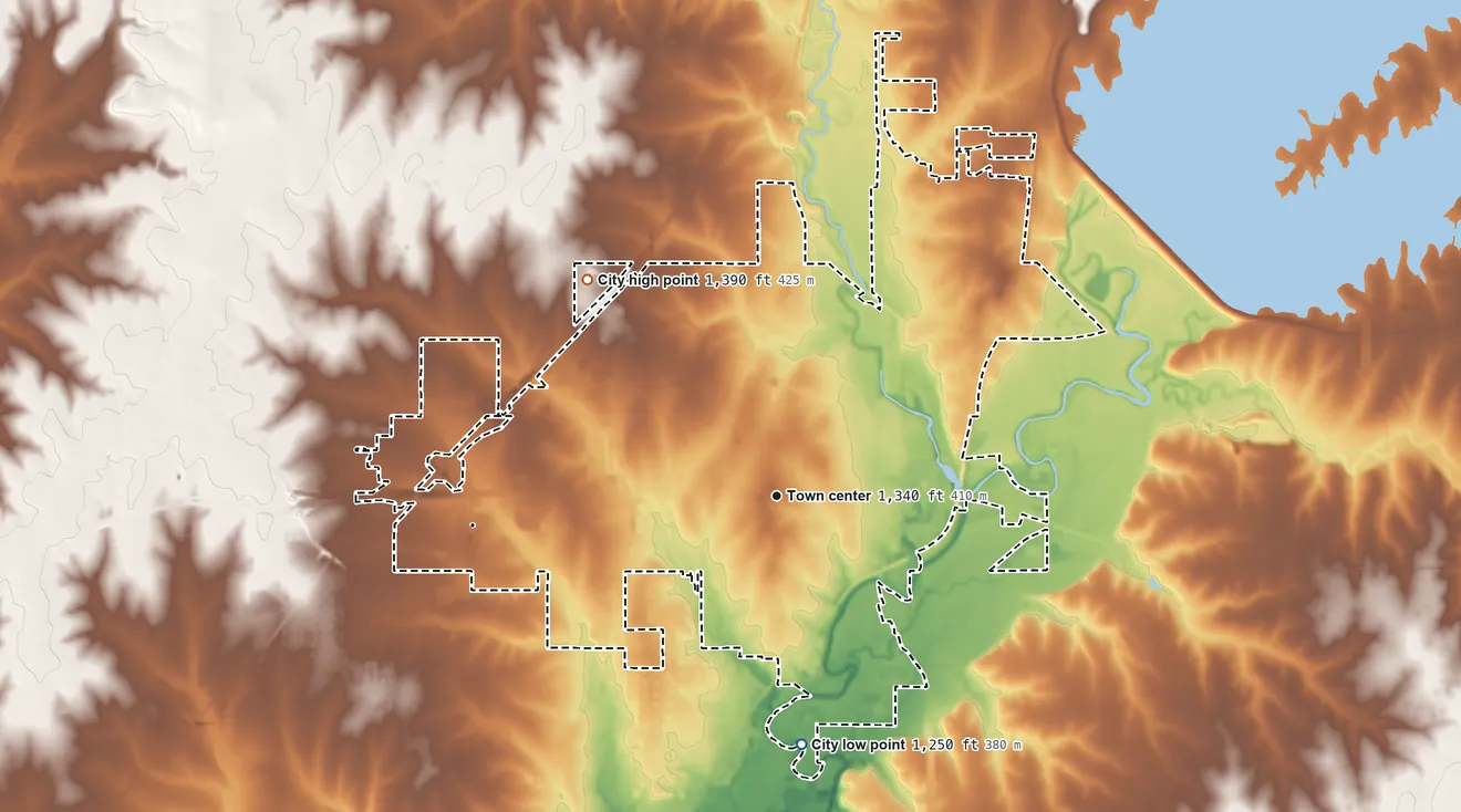 Topographic elevation map of El Dorado, Kansas, shaded from 1,250 ft on the south side to 1,390 ft on the northwest side