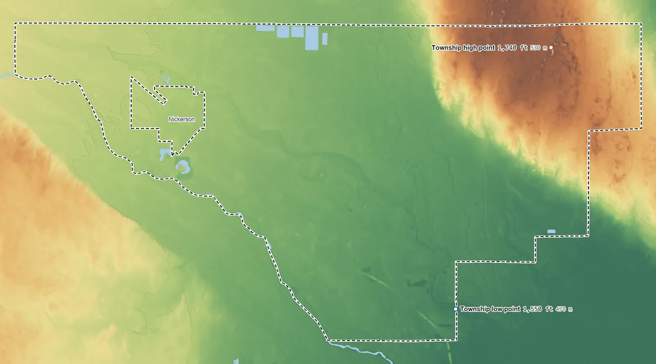 Topographic elevation map of Grant Township, Reno County, Kansas, shaded from 1,550 ft on the south side to 1,740 ft on the northeast side