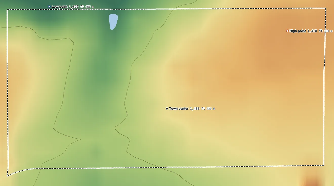 Topographic elevation map of Greenwich, Kansas, shaded from 1,390 ft on the northwest side to 1,410 ft on the northeast side