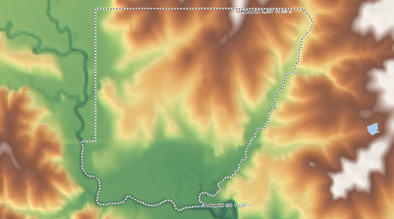 Topographic elevation map of Kickapoo Tribal Center, Kansas, shaded from 990 ft on the south side to 1,130 ft on the northeast side