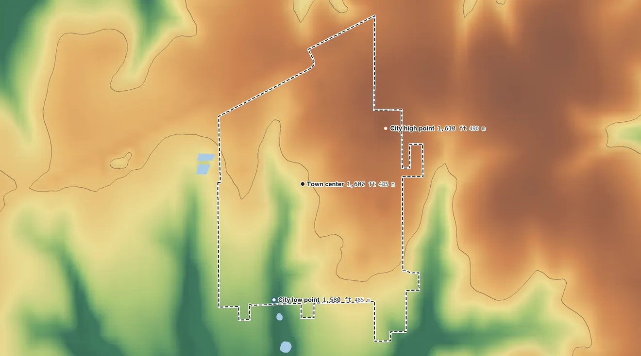 Topographic elevation map of Mahaska, Kansas, shaded from 1,580 ft on the south side to 1,610 ft on the northeast side