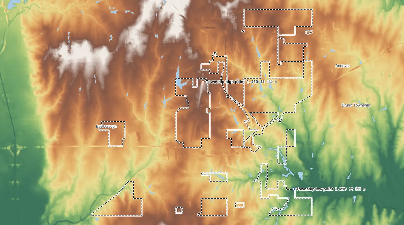 Topographic elevation map of Minneha Township, Kansas, shaded from 1,290 ft on the southeast side to 1,410 ft on the north side