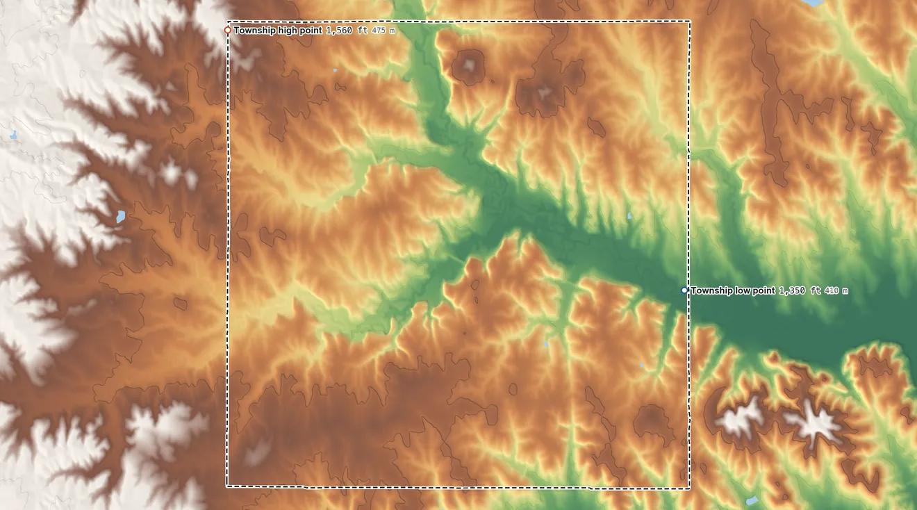 Topographic elevation map of Round Springs Township, Kansas, shaded from 1,350 ft on the east side to 1,560 ft on the northwest side
