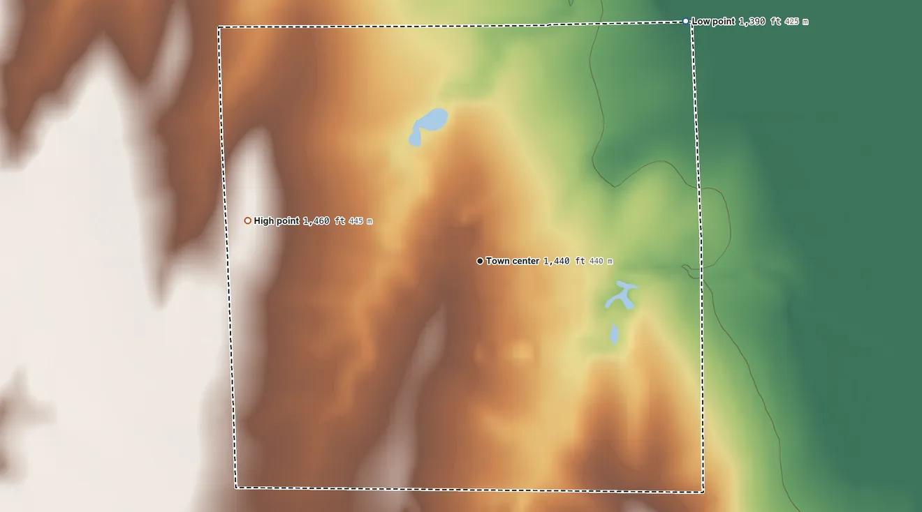Topographic elevation map of St. Marks, Kansas, shaded from 1,390 ft on the northeast side to 1,460 ft on the west side