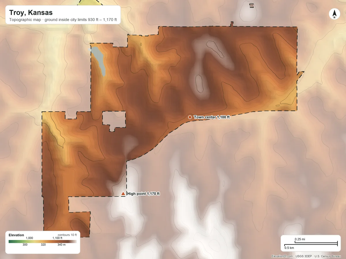 Topographic elevation map of Troy, Kansas, shaded from 930 ft on the north side to 1,170 ft on the southwest side