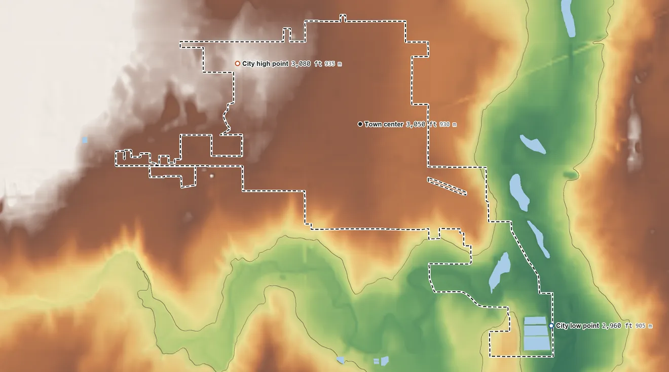 Topographic elevation map of Ulysses, Kansas, shaded from 2,960 ft on the southeast side to 3,080 ft on the northwest side