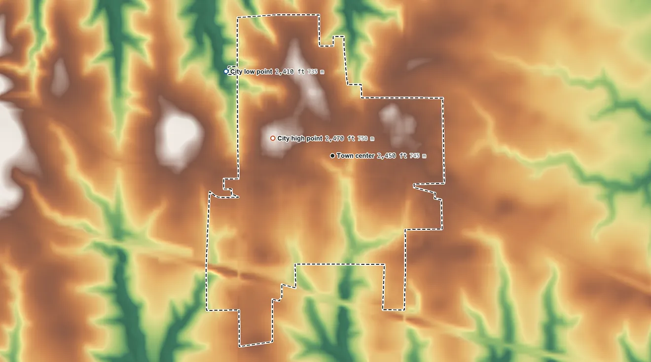 Topographic elevation map of WaKeeney, Kansas, shaded from 2,410 ft on the northwest side to 2,470 ft on the west side