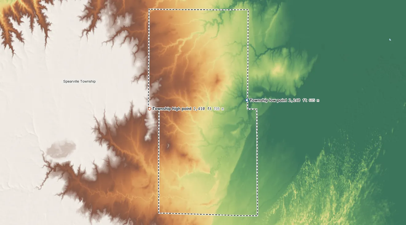 Topographic elevation map of Wheatland Township, Ford County, Kansas, shaded from 2,240 ft on the northeast side to 2,410 ft on the west side