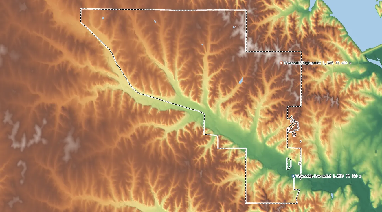 Topographic elevation map of Wildcat Township, Kansas, shaded from 1,050 ft on the southeast side to 1,380 ft on the east side