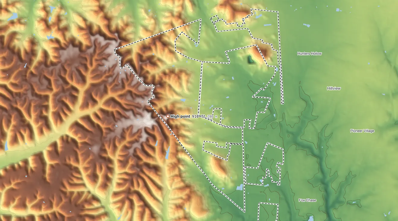 Topographic elevation map of Brooks, Kentucky, shaded from 440 ft on the south side to 910 ft on the southwest side
