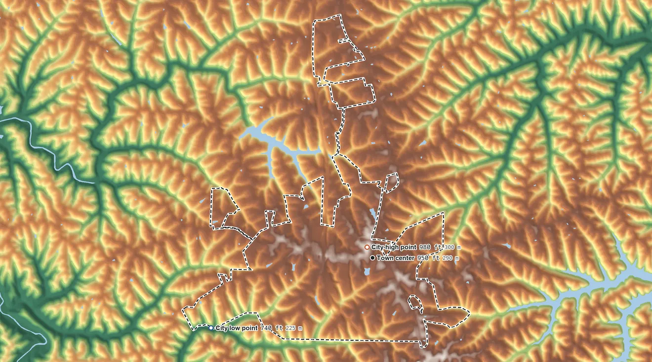 Topographic elevation map of Dry Ridge, Kentucky, shaded from 740 ft on the southwest side to 980 ft near the middle